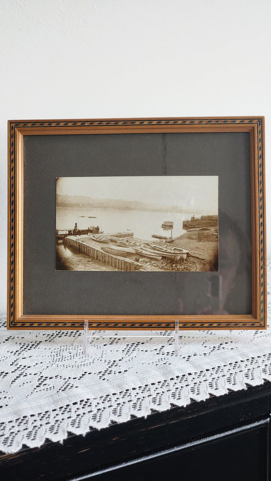 Antique framed Hudson River photograph showing rowboats at dock in inlaid wood frame with grey mat