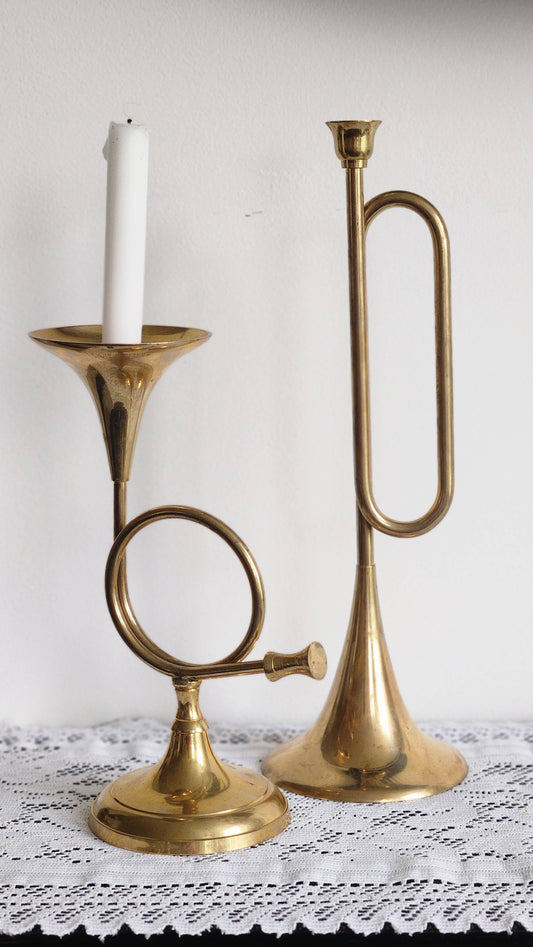 Pair of vintage brass bugle horn candleholders, one short with French horn loop and one tall with elongated bugle loop