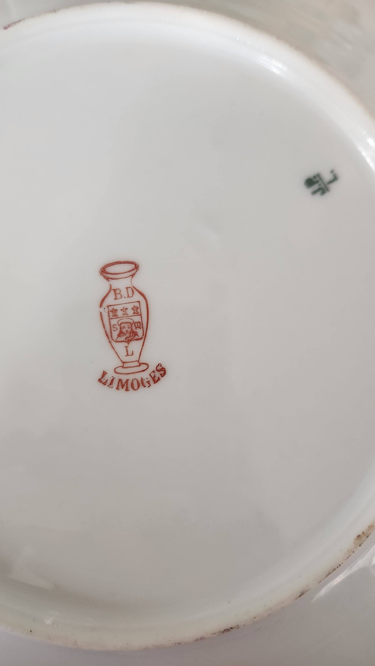 Backstamp showing H. Delinieres & Co. red vase mark with Limoges France