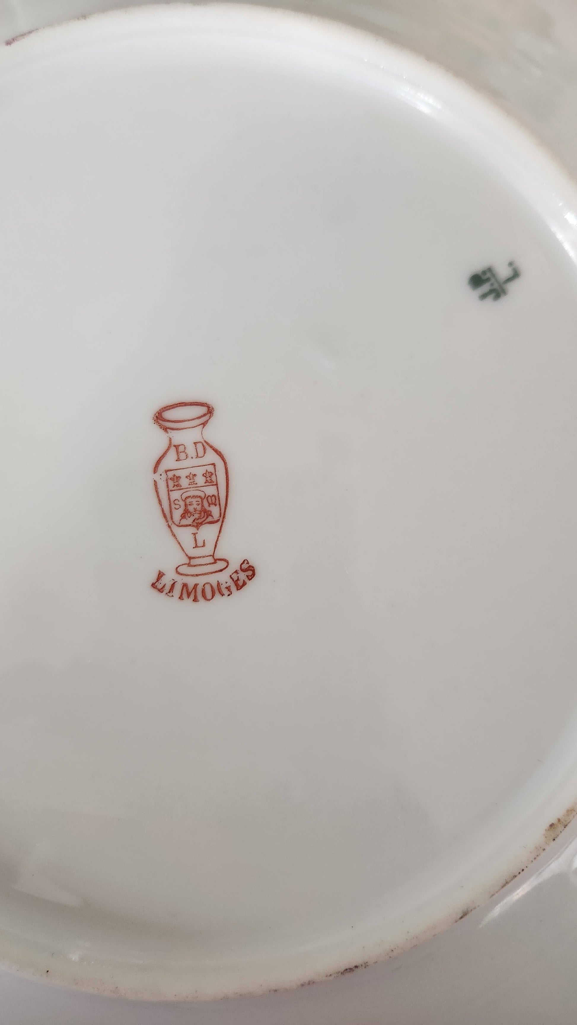 Backstamp showing H. Delinieres & Co. red vase mark with Limoges France