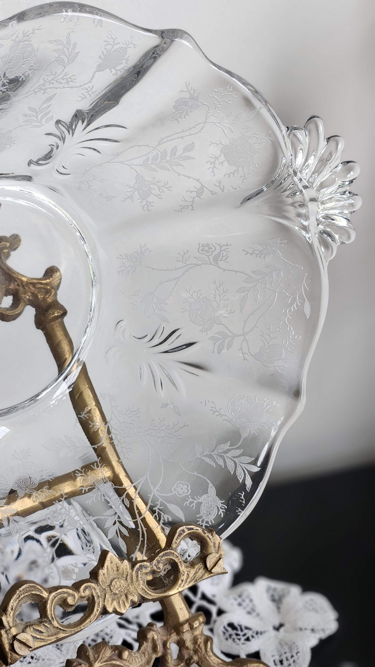 Vintage etched glass handled bowl displayed on a brass easel, easel not included